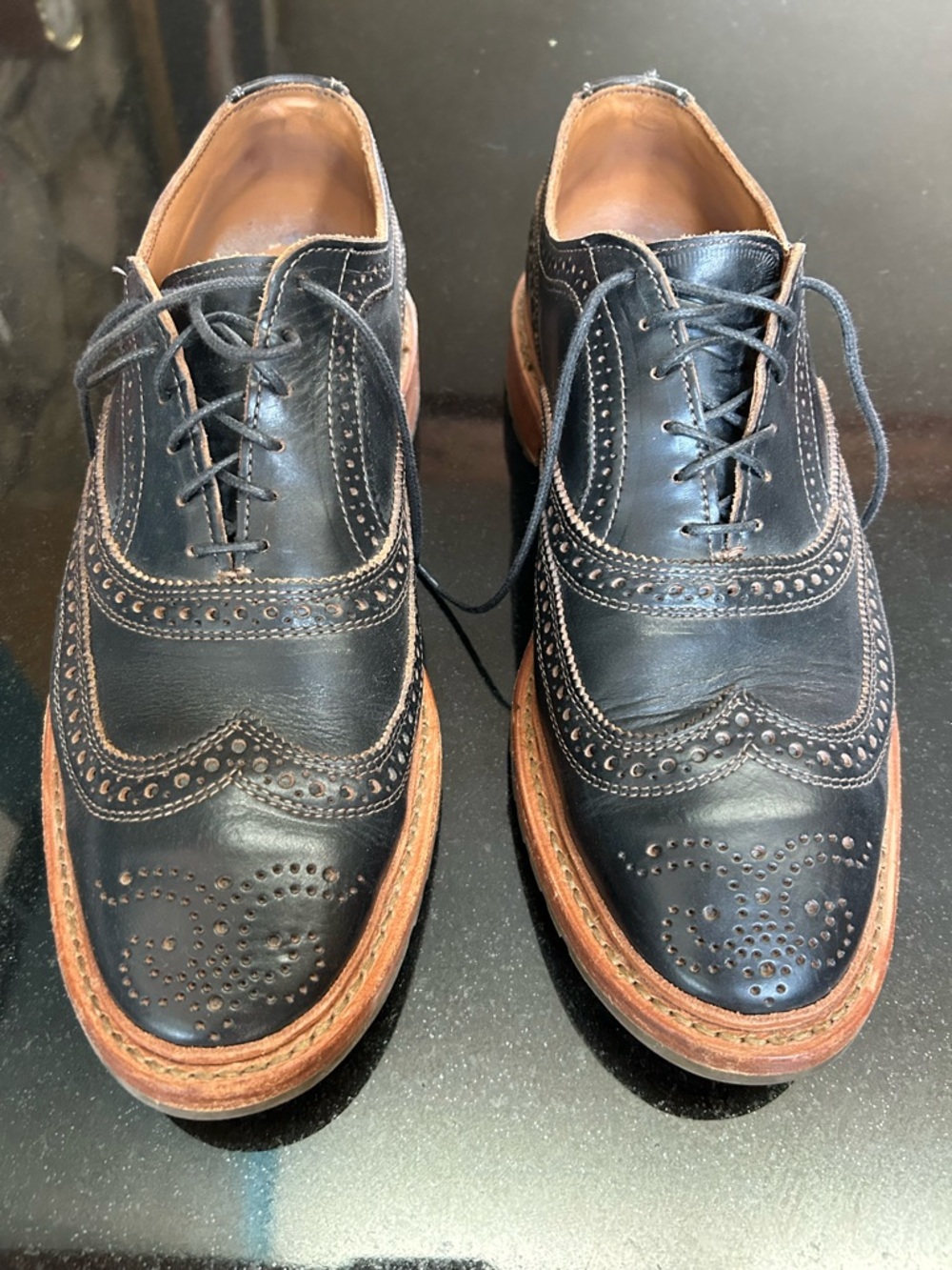 Allen Edmonds Black Leather Wingtip Brogues with Brown Soles